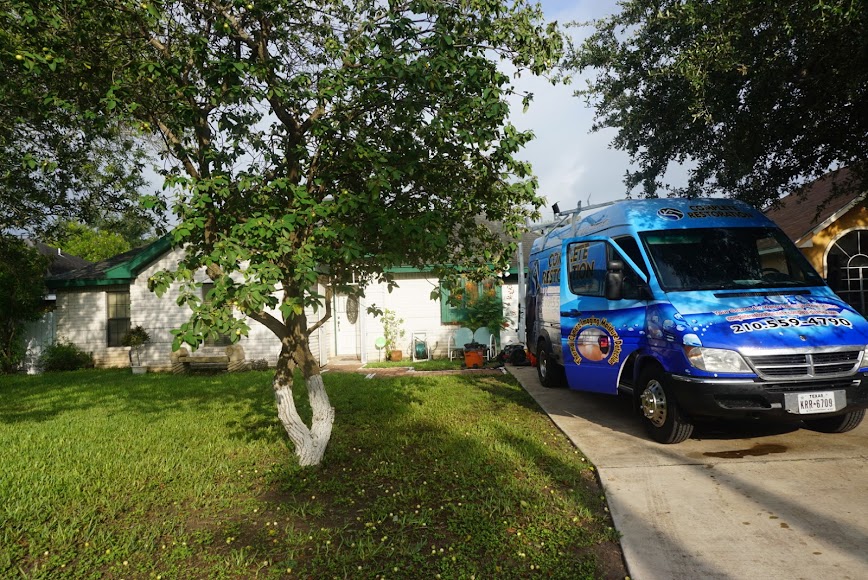 Complete Flood Restoration van in driveway