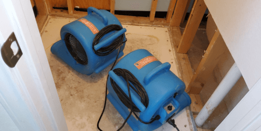 Complete Restoration's air mover fans being used in San Antonio Closet after emergency water removal call