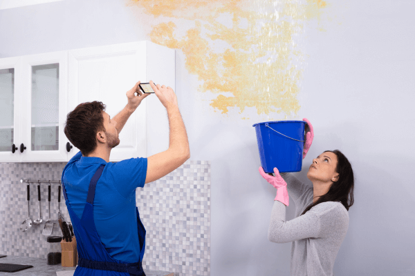 man tries to identify what category of water damage