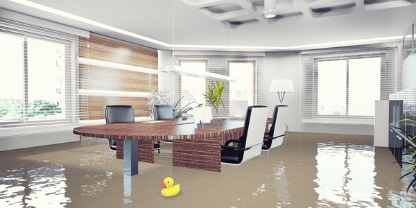 commercial water restoration- flooded office room